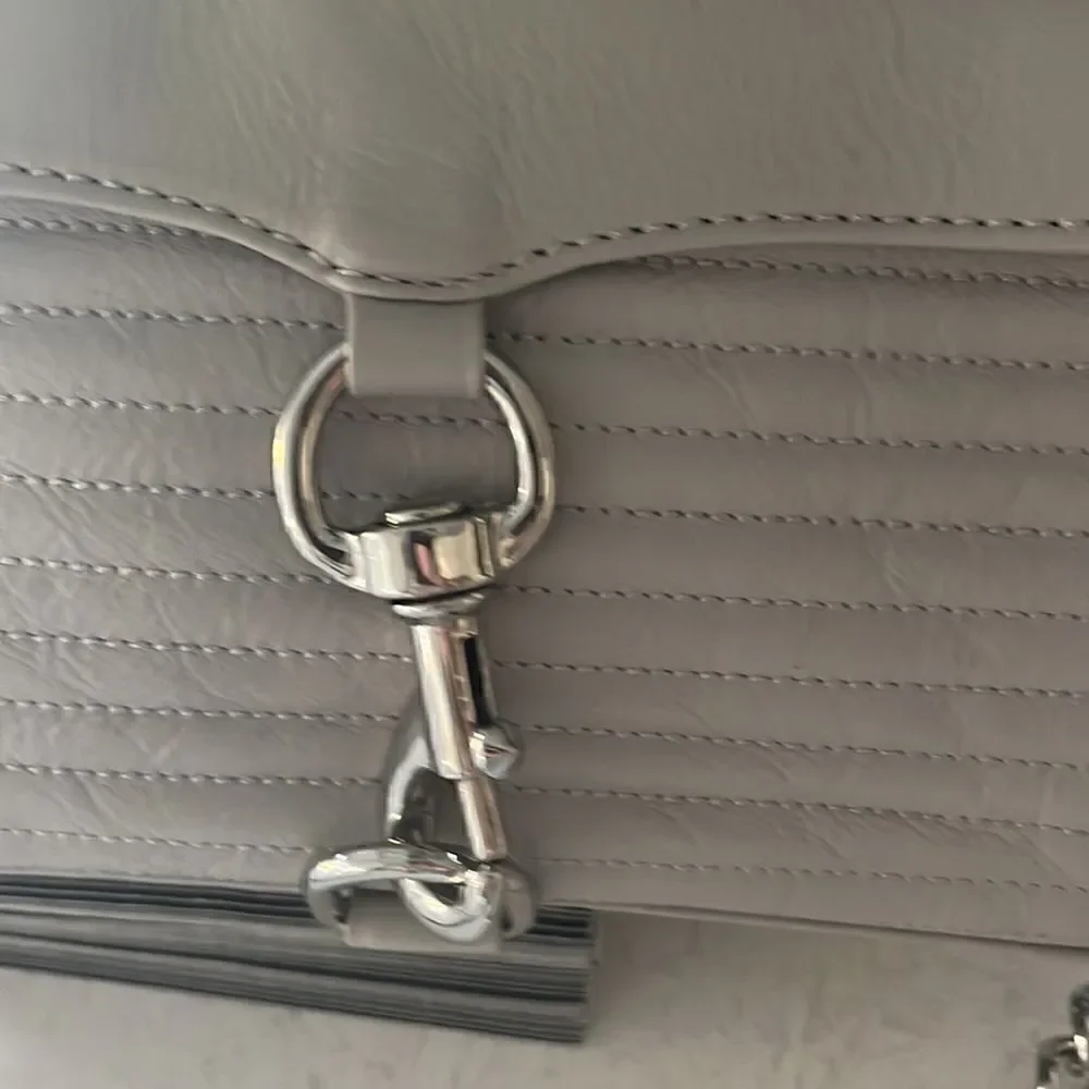 Rebecca Minkoff light gray moto leather bag with silver chain straps, crossbody